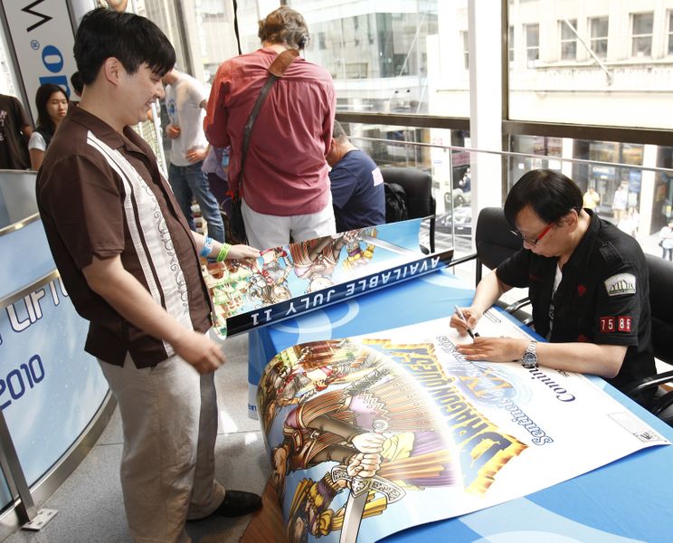 File:DQIX Launch Horii Autograph.jpg